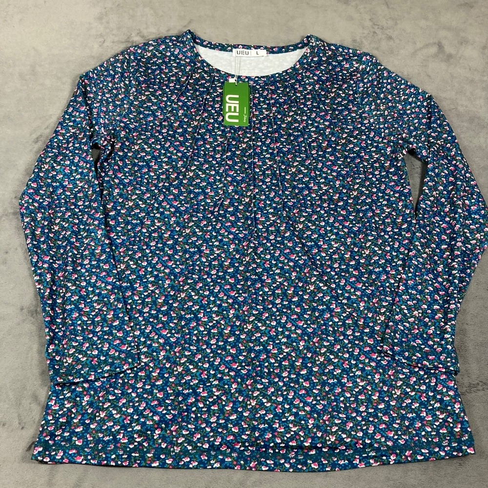 New UEU floral top by Johnny size L